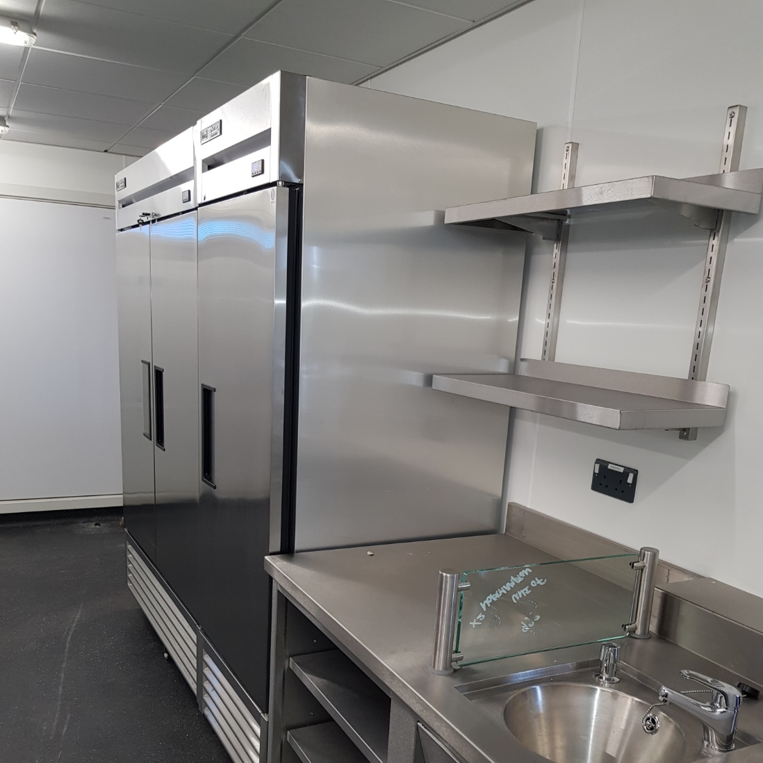 commercial refrigeration equipment in a kitchen
